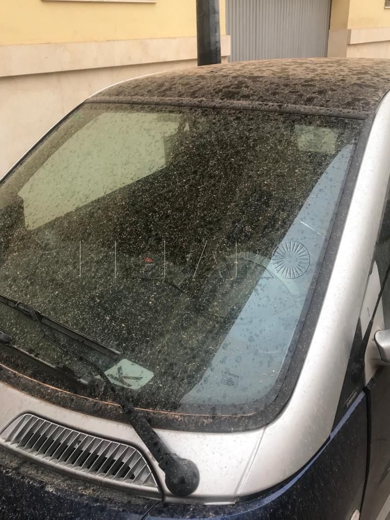 COCHE POLVO Melilla, una ciudad naranja