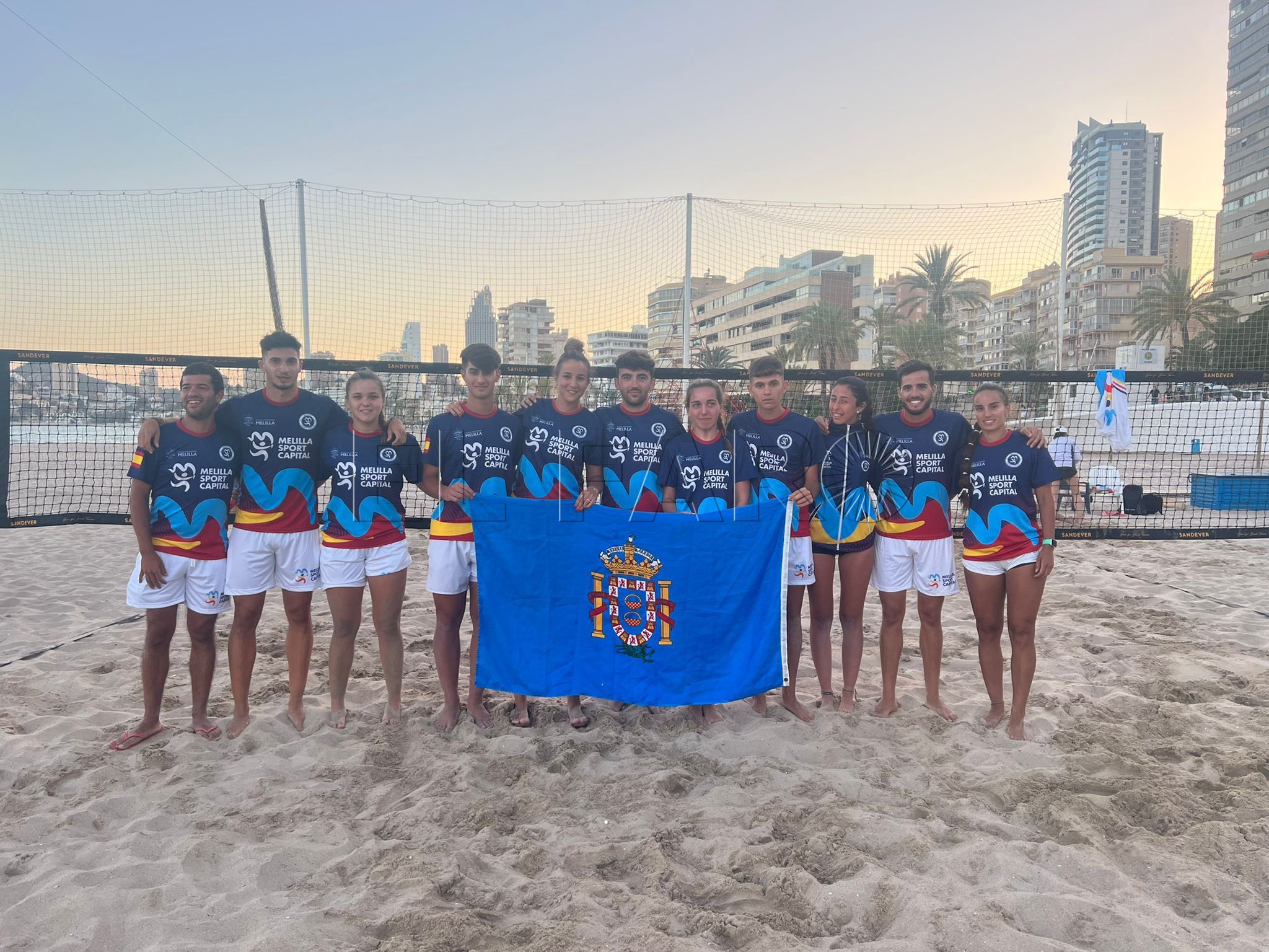FWH9FUdUAAAzmkX Melilla, bronce en el Campeonato de España de tenis playa por comunidades 2022