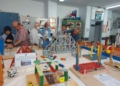 Los inspectores durante su visita a la muestra El IES Rusadir expone los inventos tecnológicos del Aula de Atención Temporal