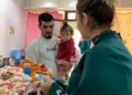 WhatsApp Image 2023 01 03 at 12.03.36 8 Vecinos Solidarios reparten juguetes e ilusión entre los niños de Melilla