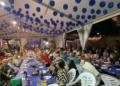 Seis asociaciones de Melilla celebraron este jueves una cena en la caseta de la A.V El Industrial