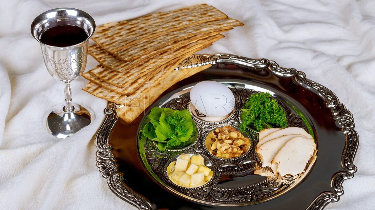 Pesah celebration concept jewish Passover holiday egg and seder plate