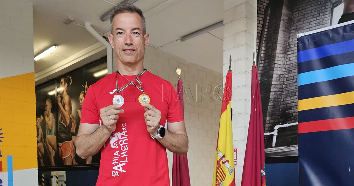 22121212 Miguel Puertas logra la medalla de oro en los 100 metros mariposa