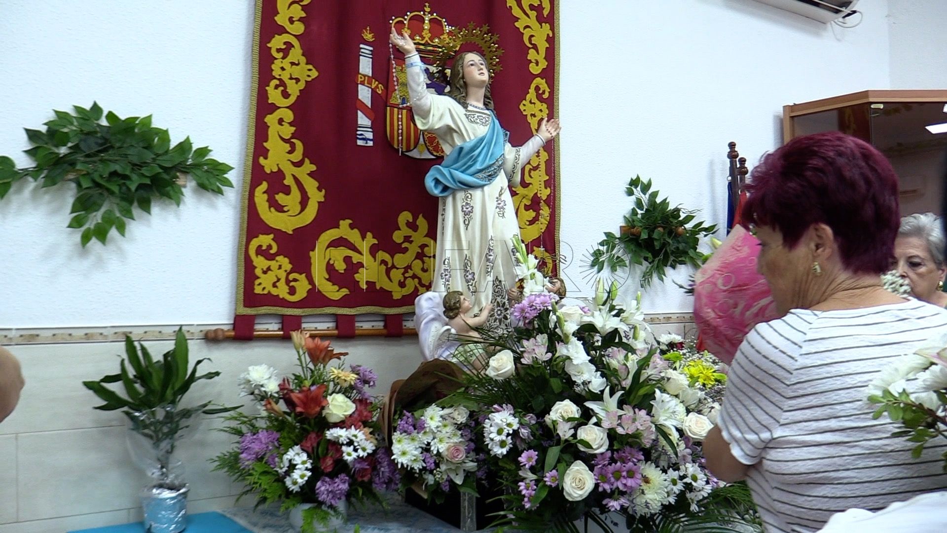28 La A.V. del Tesorillo hizo una ofrenda floral a la Virgen de la Asunción