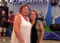 mujeres posando El Club Scorpio de Aventuras inaugura su caseta de la Feria anunciando la dimisión de su presidente