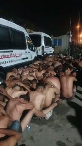 inmigrantes desnudos Marruecos trata de esclarecer la veracidad de una fotografía de un grupo de personas maniatadas