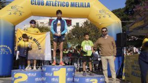 GgIG3wHW4AAjRTl Álvaro Martínez y Lucía Faus, ganadores de la San Silvestre Melilla 2024